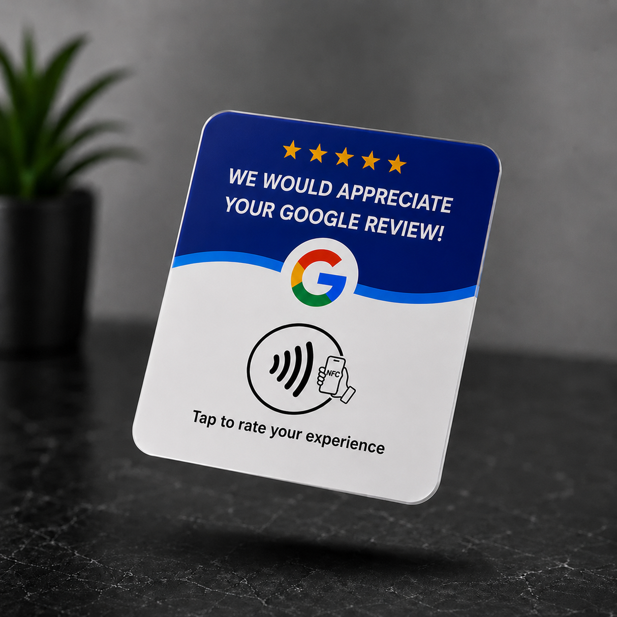 Reviewly NFC Google review stand with white and blue design on a dark counter